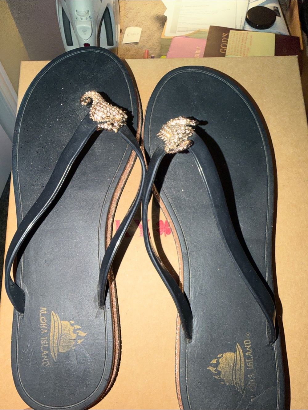 Aloha Island Black Flip Flop Sandals with Gold Rhinestone Shell Accent